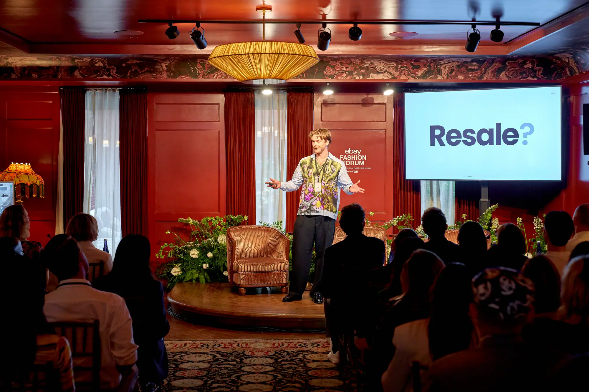Patrick White opening Ragpiq's pitch beneath a slide reading Resale?