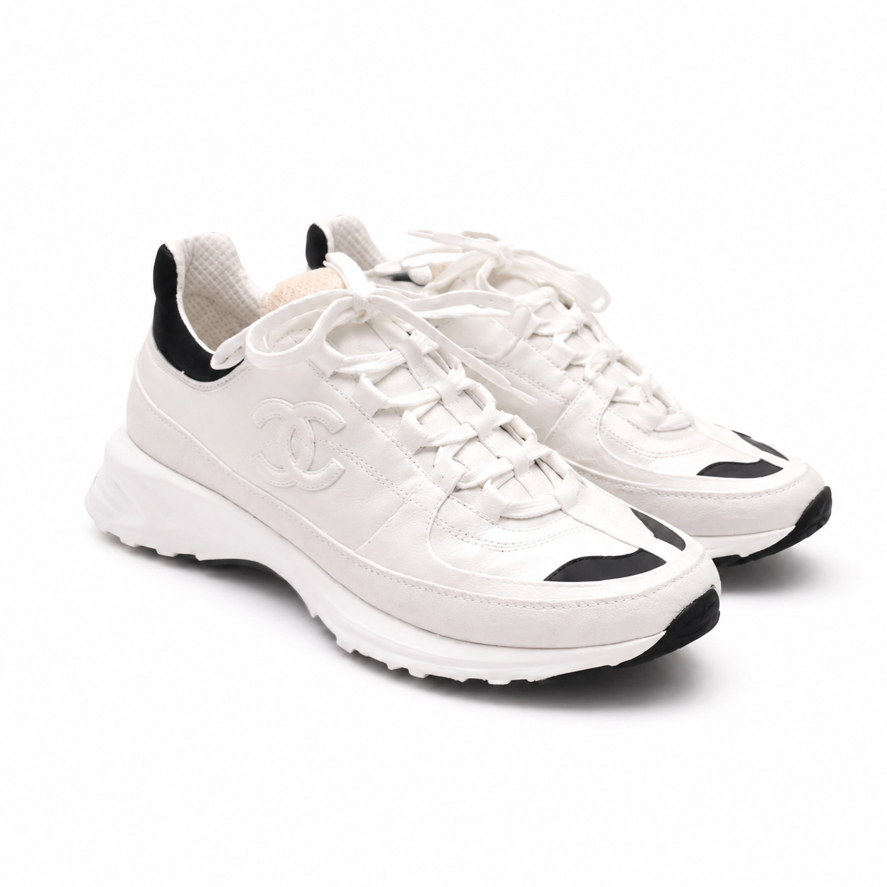 A pair of Chanel sneakers shot for a Ragpiq listing.